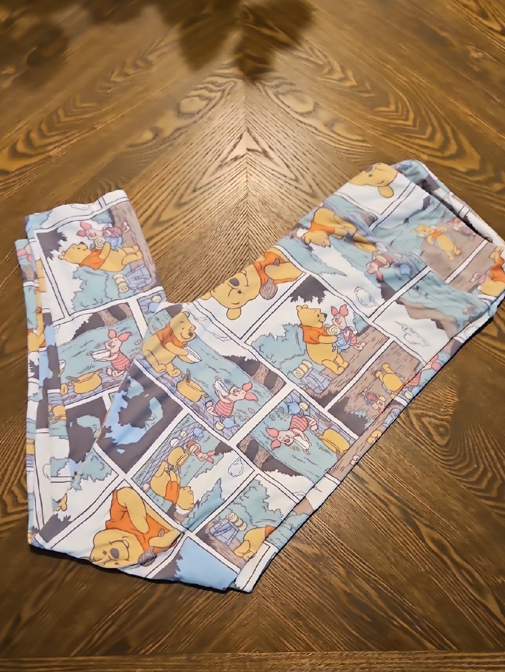 LuLaRoe Disney Winnie the Pooh Cartoon Panel Leggings — Blue, Yellow, Pink